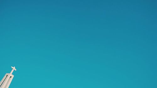 Low angle view of clear blue sky