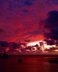 Silhouette of boats at sunset
