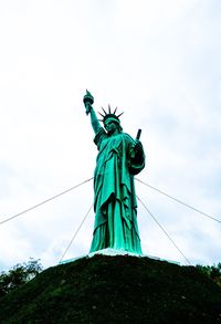 Low angle view of statue against sky