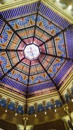 Low angle view of illuminated ceiling