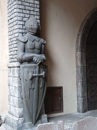 Statue against wall in building