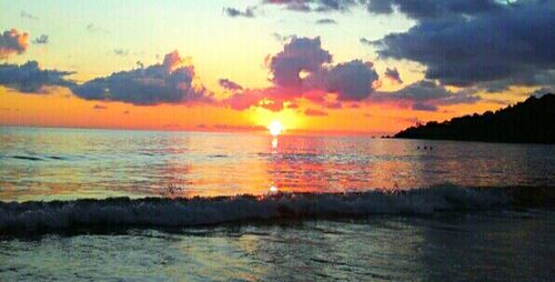 Scenic view of sea at sunset