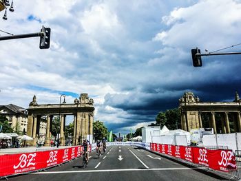 Low angle view of road against cloudy sky