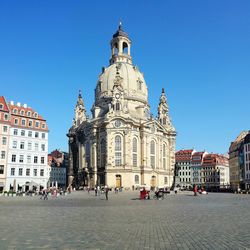 Low angle view of church against blue sky