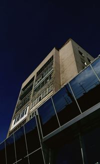 Low angle view of skyscraper against clear sky