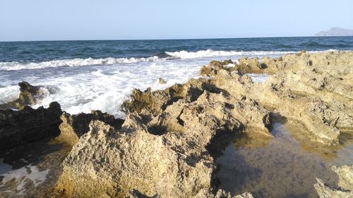Scenic view of sea against clear sky