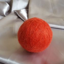 High angle view of wool ball on textile