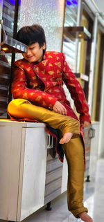 Portrait of young woman using mobile phone