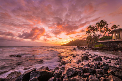 Scenic view of sea against sky during sunset