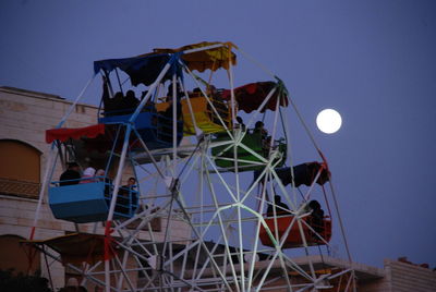 Amusement ride by building