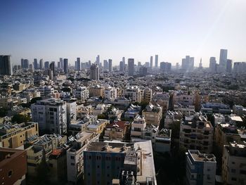 High angle view of buildings against clear sky