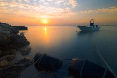 Scenic view of sea against sky during sunset