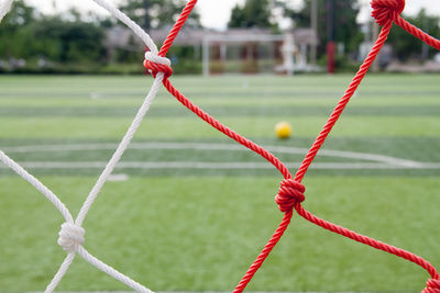 Close-up of net at soccer field