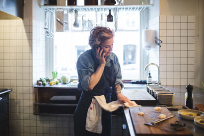 Man holding food at home