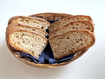 Directly above shot of bread on white background
