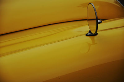 Close-up of yellow suitcase