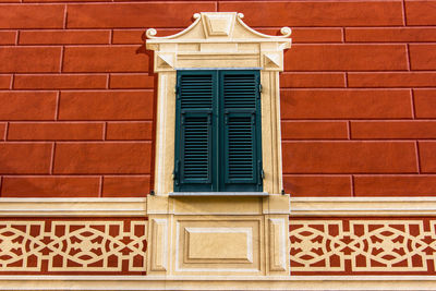 Low angle view of closed door of building