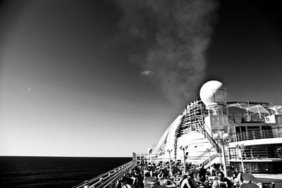 View of ferris wheel in sea