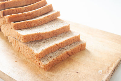 Close-up of bread on cutting board