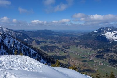 Scenic view of snowcapped mountains against sky