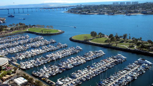 High angle view of boats moored at harbor