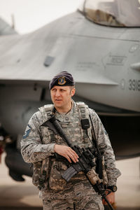 Man wearing sunglasses standing outdoors