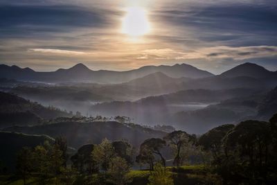 Scenic view of mountains against sky during sunset