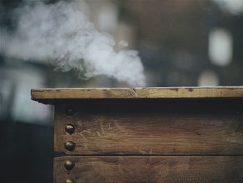 Close-up of smoke from wooden box