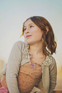 Portrait of girl looking up