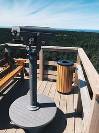 High angle view of table and sea against sky