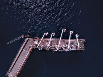 Low angle view of crane at night