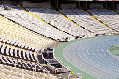 High angle view of empty soccer and athletics stadium, barcelona 