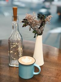 Flower vase on table