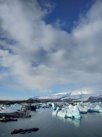 Scenic view of sea against sky during winter