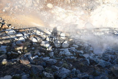 Aerial view of rocks in water