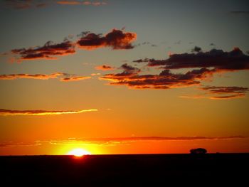 Scenic view of silhouette landscape against sky during sunset