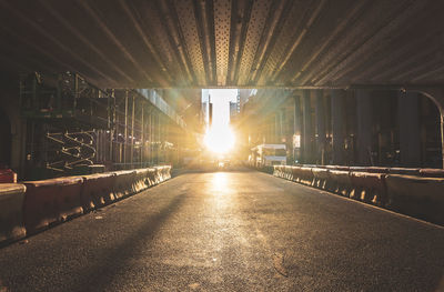 View of bridge in city at sunset