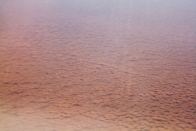 High angle view of sand on beach