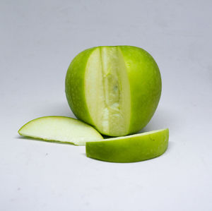 Close-up of fruit against white background