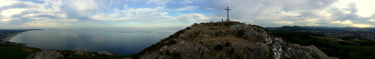 Panoramic view of sea against cloudy sky