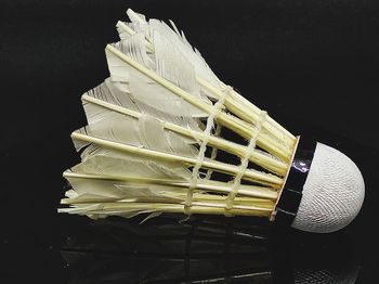 High angle view of illuminated lighting equipment on table against black background