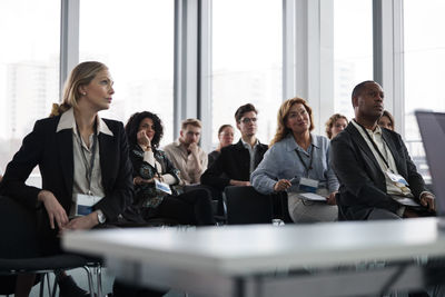 Business people sitting during business meeting