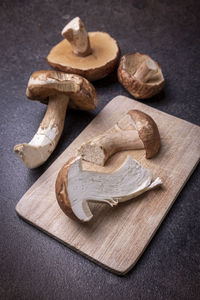 High angle view of bread on cutting board