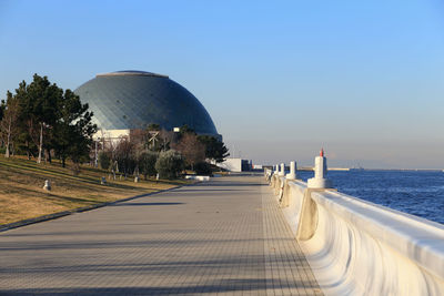 Panoramic view of sea against clear blue sky