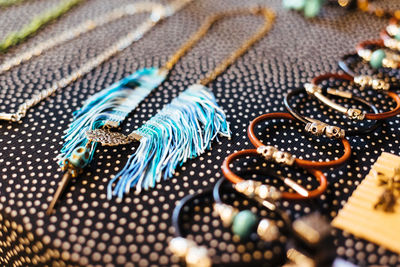 High angle view of jewelry on table