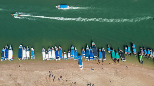 Aerial landscape view pang nga pier speed boat passenger and long tail boat on the sea beach 