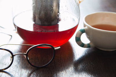 Still life tea pot and eyeglasses