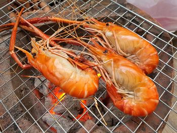Grilled shrimp by charcoal stove in thai style