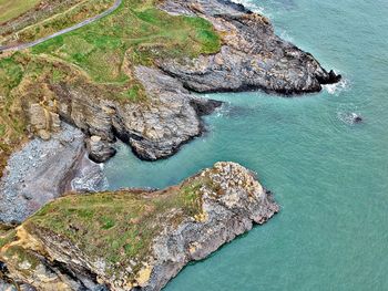 High angle view of rock formation in sea