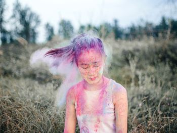 Young girl with powder paint